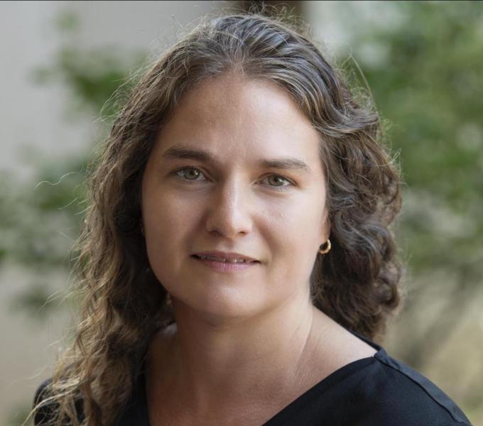 A photo of Mary Torregrossa, a woman with brown hair
